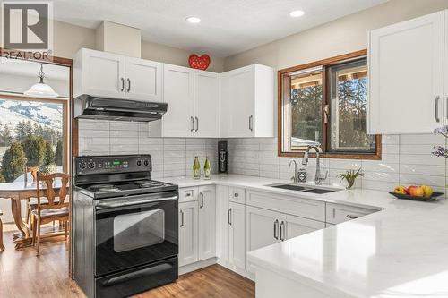 11410 Tassie Drive, Coldstream, BC - Indoor Photo Showing Kitchen With Double Sink