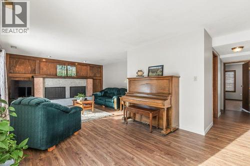 11410 Tassie Drive, Coldstream, BC - Indoor Photo Showing Living Room With Fireplace