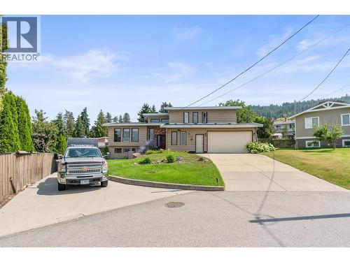 11410 Tassie Drive, Coldstream, BC - Outdoor With Facade