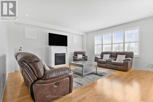 2537 Snow Knight Drive, Oshawa, ON - Indoor Photo Showing Living Room With Fireplace