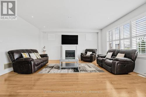 2537 Snow Knight Drive, Oshawa, ON - Indoor Photo Showing Living Room With Fireplace