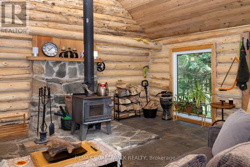 24163 Highway 7 Highway, Frontenac (Frontenac Centre), ON - Indoor With Fireplace