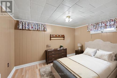 Third bedroom on lower level (virtually staged). - 5 Queen Street, Smiths Falls, ON - Indoor Photo Showing Bedroom