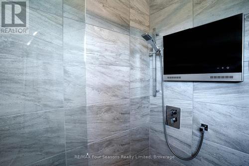 TELEVISION IN ALL SHOWERS - 116 Arnot Crescent, Blue Mountains, ON - Indoor Photo Showing Bathroom