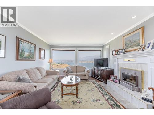 129 Sumac Ridge Drive, Summerland, BC - Indoor Photo Showing Living Room With Fireplace