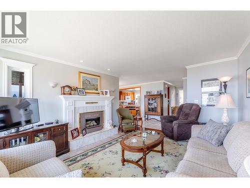 129 Sumac Ridge Drive, Summerland, BC - Indoor Photo Showing Living Room With Fireplace