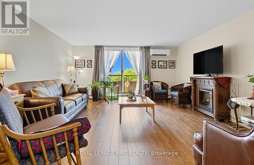 505 - 264 Grantham Avenue, St. Catharines (Carlton/Bunting), ON - Indoor Photo Showing Living Room With Fireplace