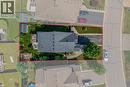 Aerial perspective showcasing a property with a dark shingle roof and a paved driveway - 174 Woodway Trail, Simcoe, ON  -  