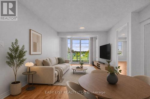 319 - 2020 Mcnicoll Avenue, Toronto, ON - Indoor Photo Showing Living Room
