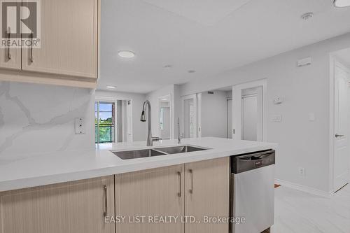 319 - 2020 Mcnicoll Avenue, Toronto, ON - Indoor Photo Showing Kitchen With Double Sink