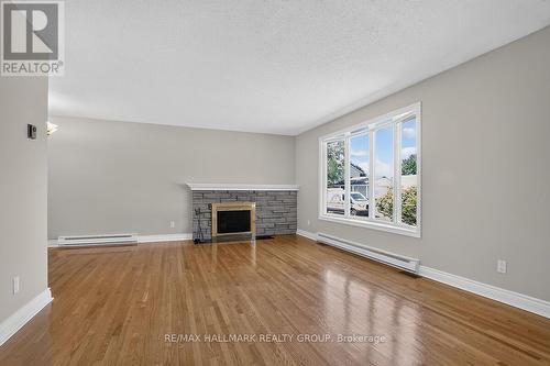 20 Cramer Drive, Ottawa, ON - Indoor Photo Showing Living Room With Fireplace