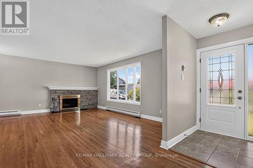 20 Cramer Drive, Ottawa, ON - Indoor Photo Showing Living Room With Fireplace