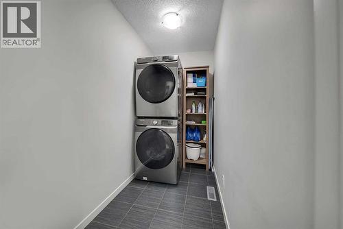 132 Howse Crescent Ne, Calgary, AB - Indoor Photo Showing Laundry Room