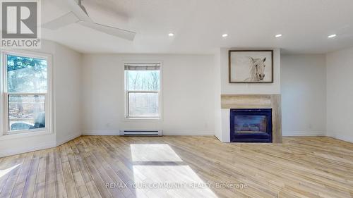 4219 Stouffville Road, Whitchurch-Stouffville, ON - Indoor With Fireplace