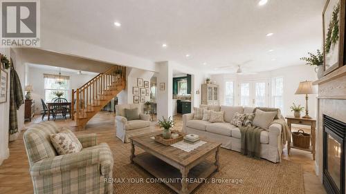 4219 Stouffville Road, Whitchurch-Stouffville, ON - Indoor Photo Showing Living Room With Fireplace
