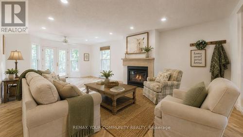 4219 Stouffville Road, Whitchurch-Stouffville, ON - Indoor Photo Showing Living Room With Fireplace