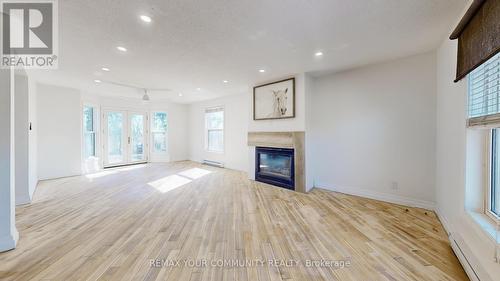 4219 Stouffville Road, Whitchurch-Stouffville, ON - Indoor Photo Showing Living Room With Fireplace