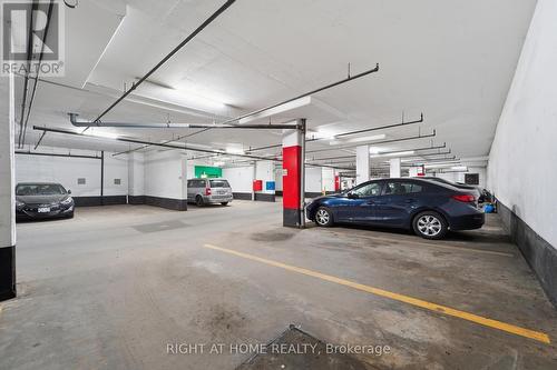1612 - 38 Lee Centre Drive, Toronto, ON - Indoor Photo Showing Garage