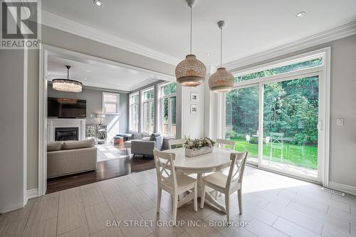 23 Trail Boulevard, Springwater, ON - Indoor Photo Showing Other Room With Fireplace
