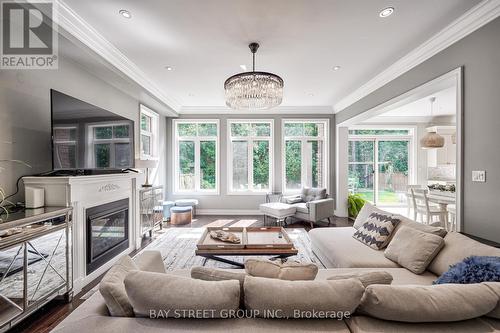 23 Trail Boulevard, Springwater, ON - Indoor Photo Showing Living Room With Fireplace