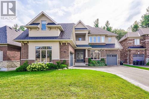 23 Trail Boulevard, Springwater, ON - Outdoor With Facade