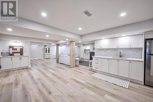 23 Trail Boulevard, Springwater, ON - Indoor Photo Showing Kitchen