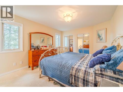 4882 Gloinnzun Crescent, 108 Mile Ranch, BC - Indoor Photo Showing Bedroom