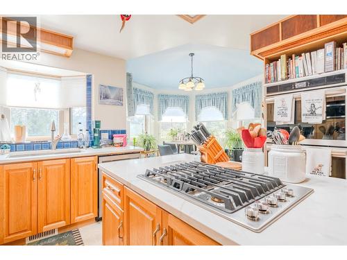 4882 Gloinnzun Crescent, 108 Mile Ranch, BC - Indoor Photo Showing Kitchen With Double Sink