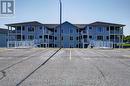 8 - 30 Mulligan Lane, Wasaga Beach, ON  - Outdoor With Balcony With Facade 