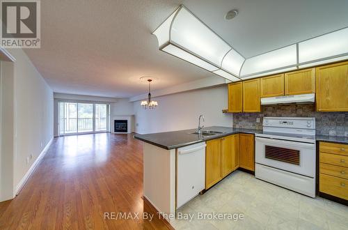 8 - 30 Mulligan Lane, Wasaga Beach, ON - Indoor Photo Showing Kitchen With Double Sink