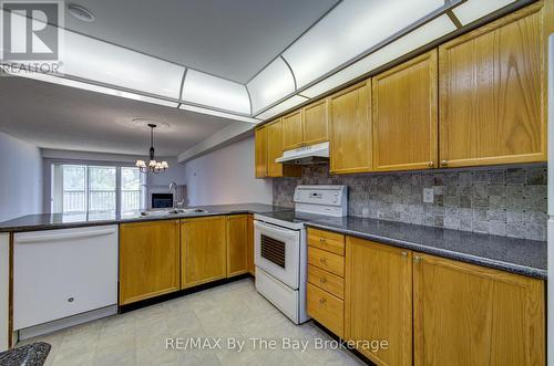 8 - 30 Mulligan Lane, Wasaga Beach, ON - Indoor Photo Showing Kitchen With Double Sink