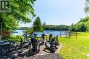 Fireplace Area - 1558 Fish Hatchery Road Unit# 10, Muskoka Lakes, ON  - Outdoor With Body Of Water 