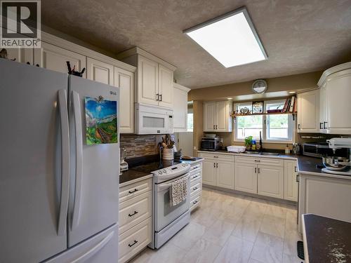 1291 Picard Avenue, Quesnel, BC - Indoor Photo Showing Kitchen With Double Sink