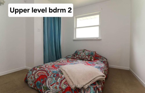 1729 Mosley Street, Wasaga Beach, ON - Indoor Photo Showing Bedroom