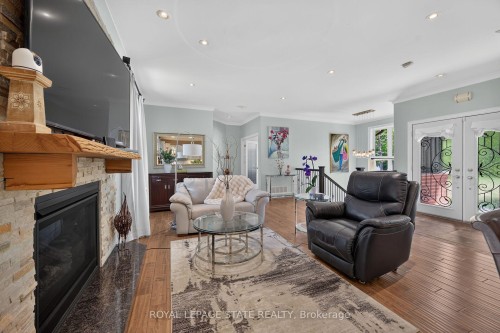 741 South Coast Drive, Haldimand, ON - Indoor Photo Showing Living Room With Fireplace