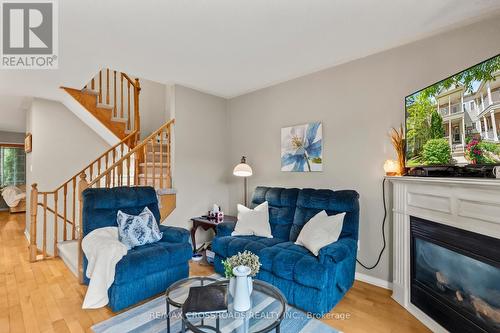67 Regatta Crescent, Whitby, ON - Indoor Photo Showing Living Room With Fireplace