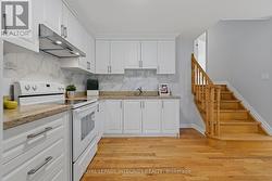 Kitchen + Stairs - Main Floor - 