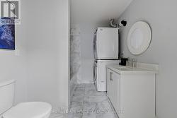 Full Bathroom+ Laundry - Main Floor - 