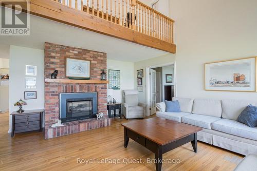 490 Silver Birch Drive, Tiny, ON - Indoor Photo Showing Living Room With Fireplace