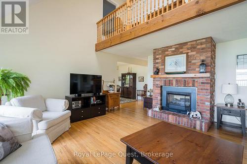 490 Silver Birch Drive, Tiny, ON - Indoor Photo Showing Living Room With Fireplace