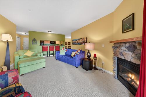 205-4767 Forsters Landing Road, Radium Hot Springs, BC - Indoor Photo Showing Living Room With Fireplace