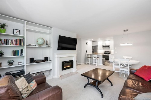 #201-3900 Shelbourne St, Saanich, BC - Indoor Photo Showing Living Room With Fireplace