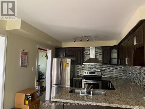 7419 Magistrate Terrace, Mississauga, ON - Indoor Photo Showing Kitchen With Upgraded Kitchen