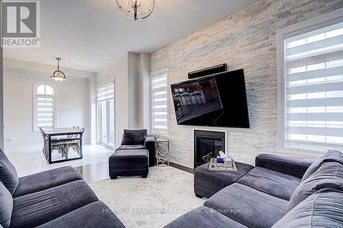 56 Botelho Circle, Aurora, ON - Indoor Photo Showing Living Room With Fireplace