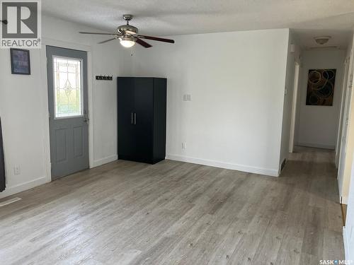 110 4Th Street N, Nipawin, SK - Indoor Photo Showing Other Room With Fireplace