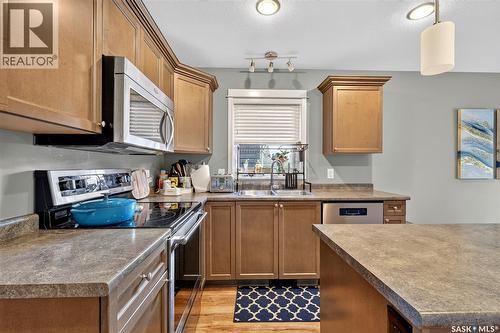 416 Loeppky Avenue, Dalmeny, SK - Indoor Photo Showing Kitchen With Double Sink