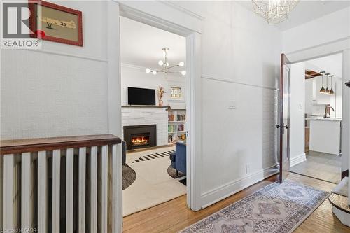 37 Connaught Avenue S, Hamilton, ON - Indoor Photo Showing Other Room With Fireplace