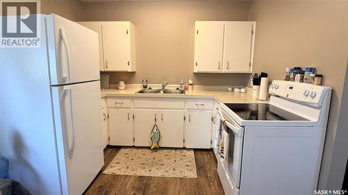 A 412 Heritage Drive, Estevan, SK - Indoor Photo Showing Laundry Room