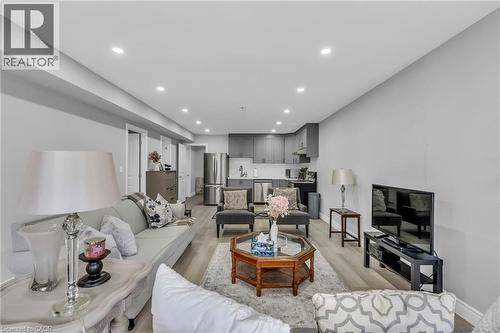 Open-concept living area featuring recessed lighting and light wood-finish flooring - 2195 Ironwood Road, London, ON - Indoor Photo Showing Living Room