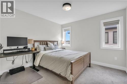 Carpeted room featuring light gray walls and white trim - 2195 Ironwood Road, London, ON - Indoor Photo Showing Bedroom